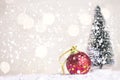 Miniature Christmas Santa cros and Tree on snow over blurred bokeh background,Decoration Image for Christmas Holiday and Happy New Royalty Free Stock Photo