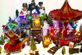 Christmas village miniature with carousel, toy shop and ferris wheel Royalty Free Stock Photo