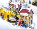 Miniature Christmas village scene. Christmas decorations toys. Royalty Free Stock Photo