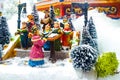 Miniature Christmas village scene. Christmas decorations toys. Royalty Free Stock Photo