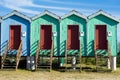 miniature colourful fisherman huts in a row