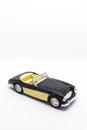 Miniature convertible car isolated on a white background Royalty Free Stock Photo