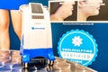 Miniature Coolsculpting machine model in a medspa clinic, on a patient bed in a branded room for