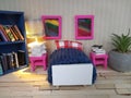 Miniature doll house bedroom scene