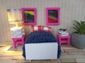 Miniature doll house bedroom scene
