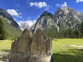 A miniature of Drei Zinnen with the view of the real mountains in the back in Italian Dolomites Royalty Free Stock Photo