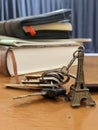 Miniature Eiffel tower key chain and some keys and books Royalty Free Stock Photo