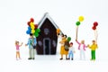 Miniature family: Childrens playing balloon together. Image use for background International day of families concept Royalty Free Stock Photo