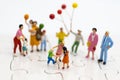 Miniature family: Childrens playing balloon together. Image use for background International day of families concept Royalty Free Stock Photo