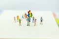 Miniature family: Childrens playing balloon together. Image use for background International day of families concept Royalty Free Stock Photo