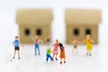 Miniature family: Childrens playing together. Image use for background International day of families concept