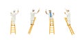 Painter standing on wooden ladder and posturing in painting wall with paint tools isolated on white background. Royalty Free Stock Photo