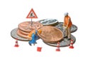 Miniature figures working on a heap of Dollar coin Royalty Free Stock Photo