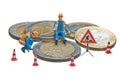 Miniature figures working on a heap of Euro coins. Royalty Free Stock Photo
