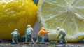 Miniature Workers Harvesting Fresh Lemon Juice Royalty Free Stock Photo