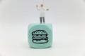 miniature figurine of a chef with a symbol of fast food