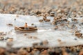 Miniature fishermen are fishing by boat Royalty Free Stock Photo