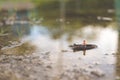 Miniature fishermen are fishing by boat Royalty Free Stock Photo