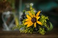 Miniature flower bouquet on wooden background