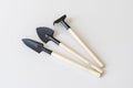 Miniature gardening tools set with white background