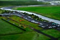 Miniature green parking lot, next to camping. On Iceland.