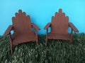 Miniature Handmade patio chairs on a grass Royalty Free Stock Photo