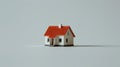 A miniature house model on a plain white background Royalty Free Stock Photo