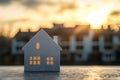 Miniature House Model with Shadow - Real Estate Concept on Gray Background Royalty Free Stock Photo