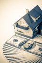 Miniature House and Money. Royalty Free Stock Photo