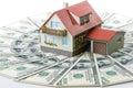 Miniature House and Money. Royalty Free Stock Photo