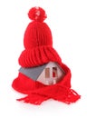 Miniature House with Red Wool Scarf Hat Royalty Free Stock Photo