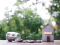 Miniature house and stack of coins. The concept of saving money for house, Property investment, House mortgage, Real estste Royalty Free Stock Photo