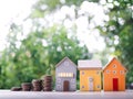 Miniature house and stack of coins. The concept of saving money for house, Property investment, House mortgage, Real estste Royalty Free Stock Photo