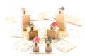 Miniature houses on wooden cubes and some euro and dollar bills Royalty Free Stock Photo