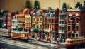 A miniature imaginary city built from plastic bricks. Residential and commercial buildings are built facing the road.