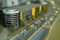 Miniature layout of a city block with multi-level parking