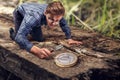 Miniature Man Discovery- A Big Euro Coin Royalty Free Stock Photo