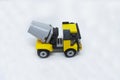 A miniature model of a Construction Mixer Lorry made of plastic bricks