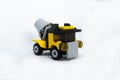 A miniature model of a Construction Mixer Lorry made of plastic bricks