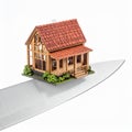 Home on a Knifes Edge - Financial Risk Concept Royalty Free Stock Photo