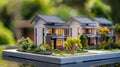 Miniature model of a residential area with detailed houses and landscaping
