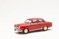 Miniature model of a vintage retro car toy on a white background Royalty Free Stock Photo