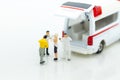 Miniature people : ambulance for treatment of patients far from medical facilities. Image use for health care concept Royalty Free Stock Photo