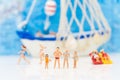 Miniature people : Big family Spend time at the sea. Happy playing together Royalty Free Stock Photo