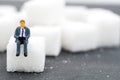 Miniature people buisnessmen sugar. Health care concept. Royalty Free Stock Photo