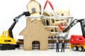 Miniature people : businessman Construction site with equipment. Royalty Free Stock Photo