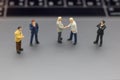 Miniature people: Businessman handshake to business success Online on laptop. Commitment, agreement, investment and partnership c Royalty Free Stock Photo