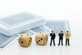Miniature people: Businessman with paper and dice . Image use for risk of business concept.