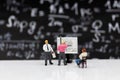 Miniature people : Businessman planning work process. Image use for finding solution/solve, innovation for business Royalty Free Stock Photo