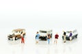 Miniature people : Businessman standing with car. Image use for